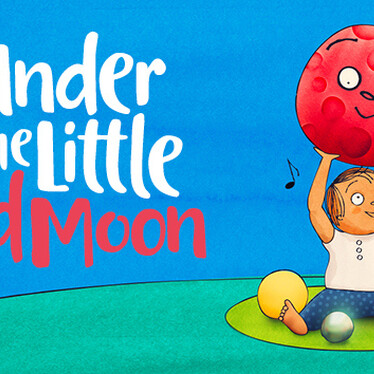 A bright blue background with the title 'Under the Little Red Moon'. A young boy sits on the floor holding up a large red ball with a smiling face