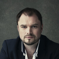 Alexander James Edwards (A dark haired man with a neat goatee)