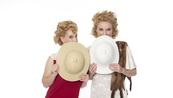 Season artwork for ETO's Così fan tutte, two sisters dressed in 1920's clothes, they are holding two hat's that explorers might wear, they are using them to hide their faces and are playfully peeking over the tops of the hats.