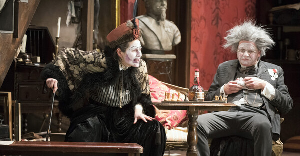 Zita sat at a table with Simone