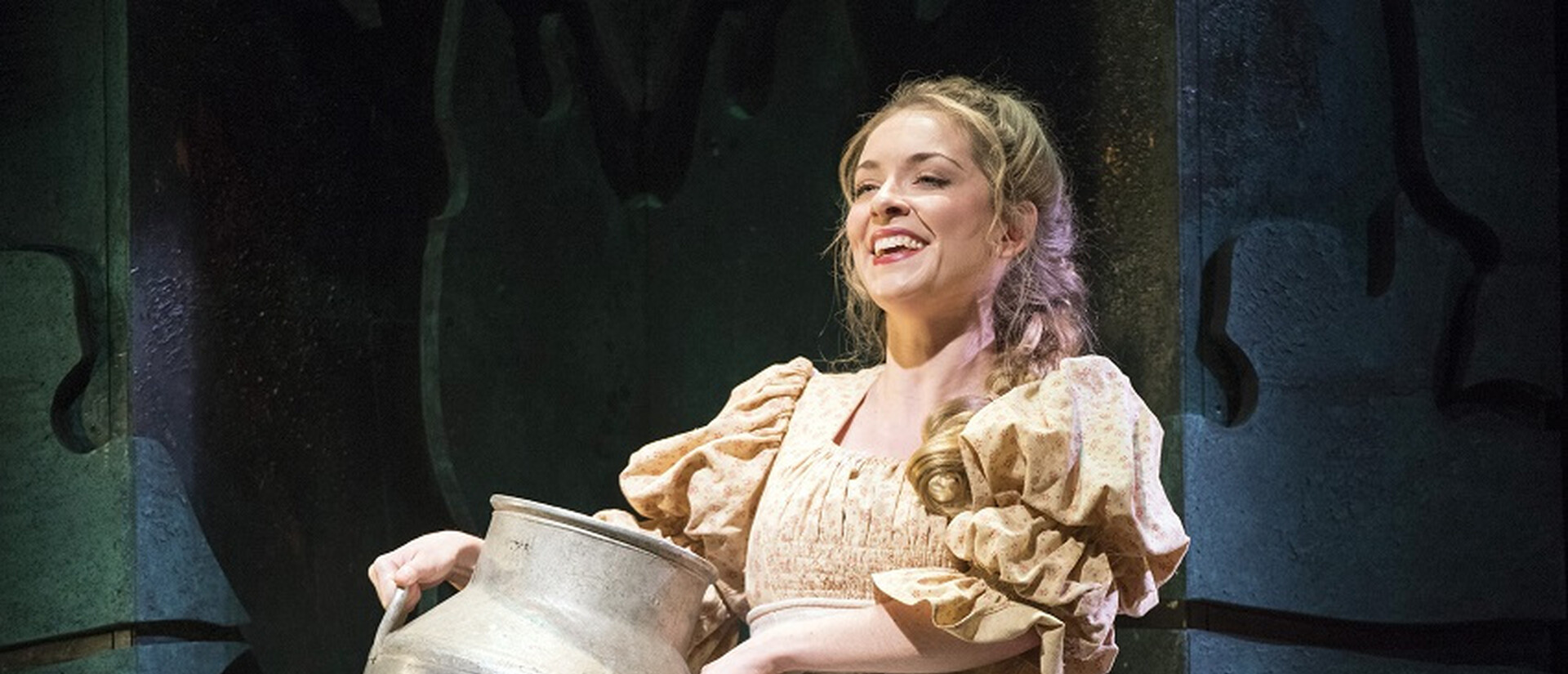 The title charactar smiles in G&S's Patience