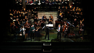 Conductor with orchestra, soloists and choirs